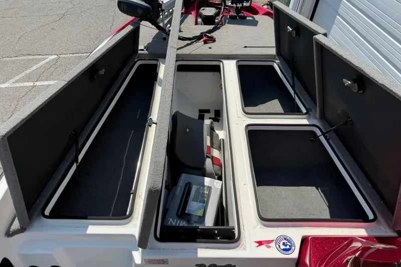 Slide: The Image of 2020 Bass Cat Pantera Classic boat storage compartments open, showcasing spacious interior. - 29