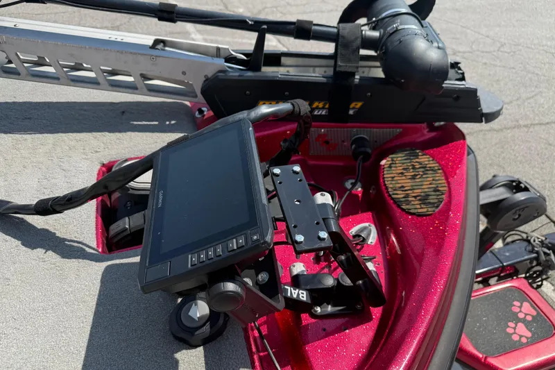 Slide: The Image of 2020 Bass Cat Pantera Classic boat dashboard with Garmin display and trolling motor. - 27
