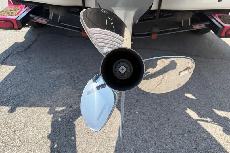 Slide: The Image of 2020 Bass Cat Pantera Classic boat propeller on asphalt background. - 19