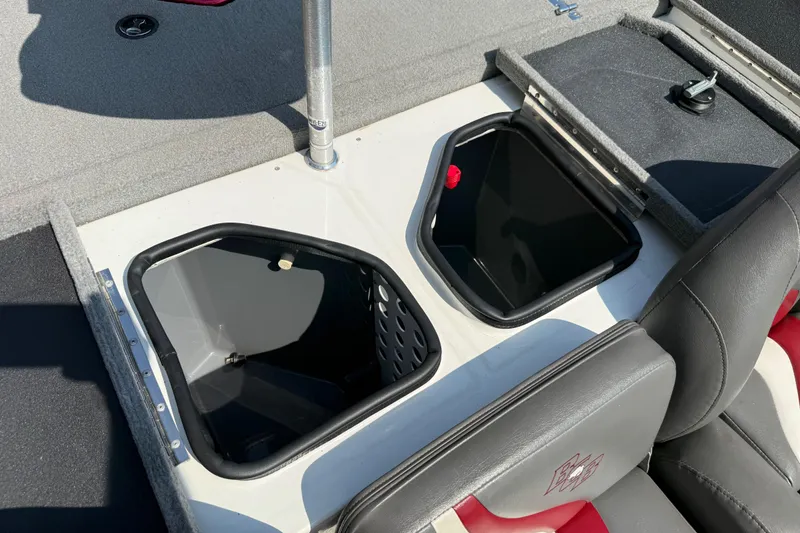 Slide: The Image of 2020 Bass Cat Pantera Classic boat storage compartments with open lids and seating area. - 41