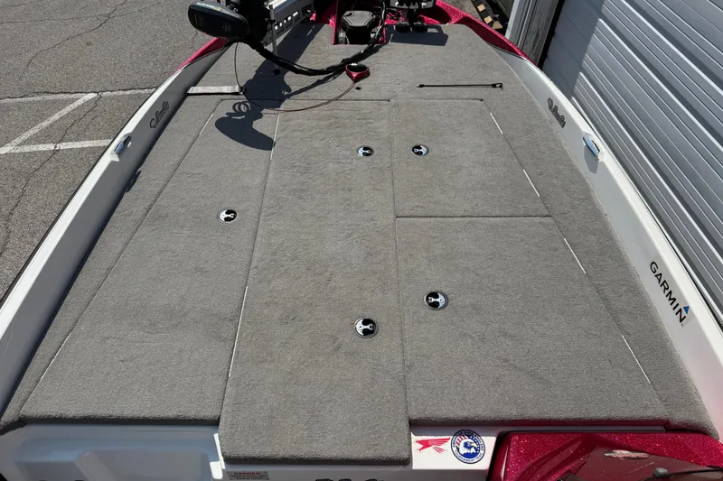 Slide: The Image of 2020 Bass Cat Pantera Classic boat deck with carpeted surface and storage compartments. - 30