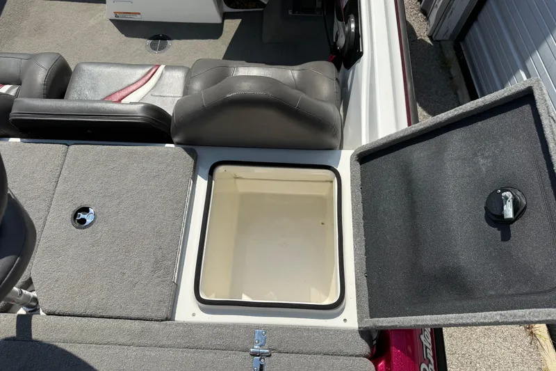 Slide: The Image of 2020 Bass Cat Pantera Classic boat interior with open storage compartment and seating. - 39