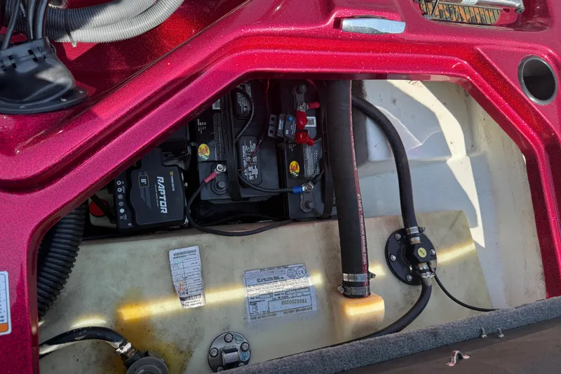 Slide: The Image of 2020 Bass Cat Pantera Classic boat battery compartment with wiring and components. - 45