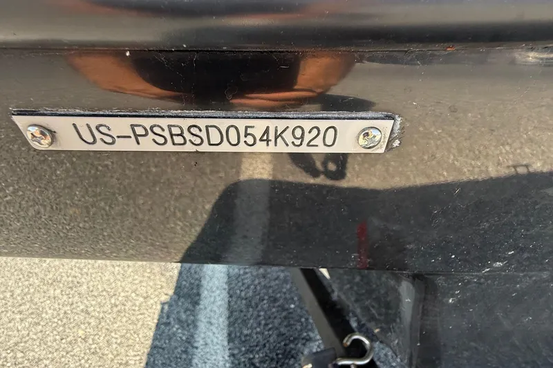 Slide: The Image of 2020 Scarab 255 Open ID boat with visible hull identification number plate. - 19