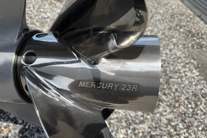 Slide: The Image of Close-up of a Mercury 23R propeller on a Skuta 24 Cat, 2027 model. - 21