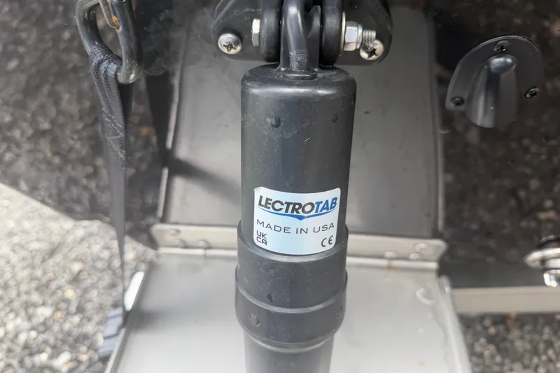 Slide: The Image of Close-up of Lectrotab component on 2027 Skuta 24 Cat boat, made in USA. - 15