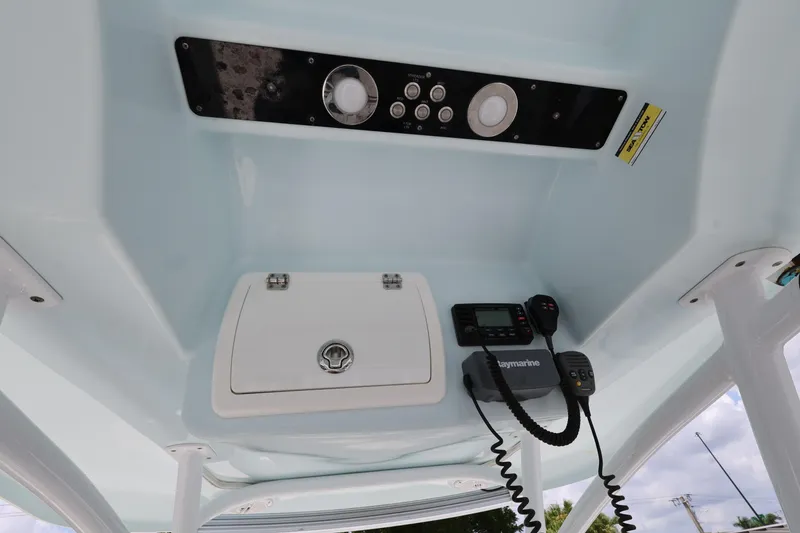 Slide: The Image of 2015 Sea Fox 286 Commander boat console with controls and Raymarine equipment. - 13