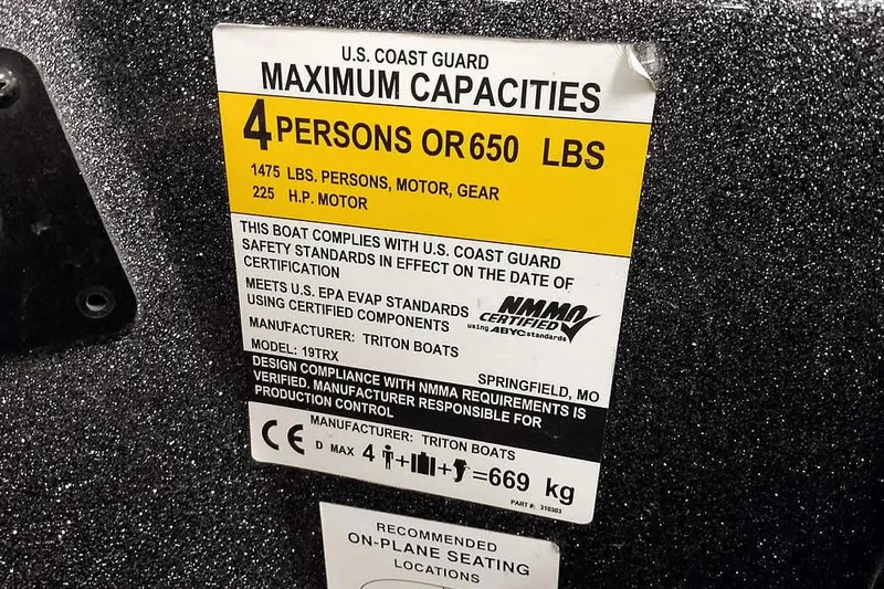 Slide: The Image of Label on 2015 Triton 19 TrX boat showing maximum capacity of 4 persons or 650 lbs. - 27