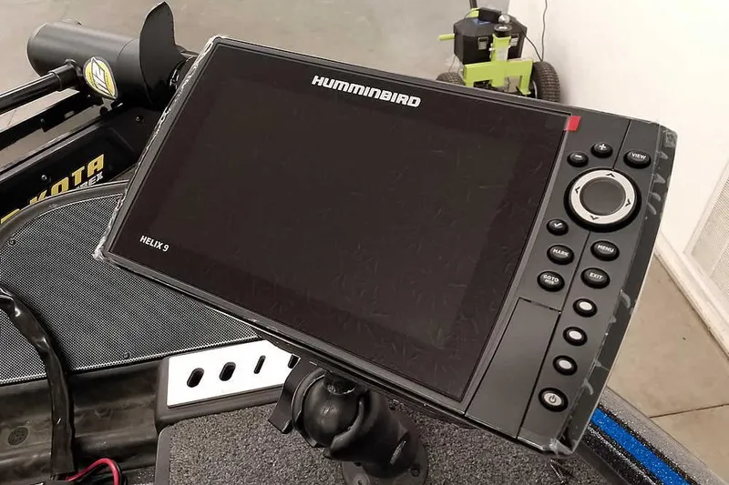 Slide: The Image of Humminbird Helix 9 fish finder on 2015 Triton 19 TrX boat dashboard. - 23