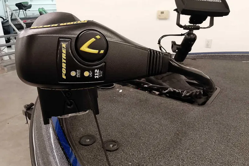 Slide: The Image of Triton 19 TrX 2015 boat with Fortrex trolling motor, featuring advanced digital controls. - 12
