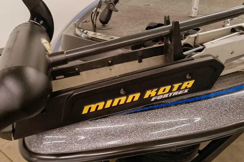Slide: The Image of Minn Kota Fortrex trolling motor on 2015 Triton 19 TrX boat deck. - 11