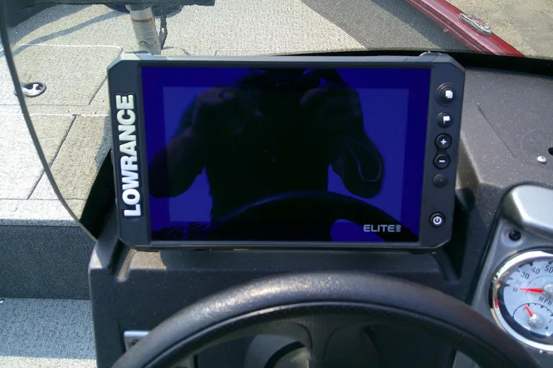 Slide: The Image of Lowrance Elite fishfinder on 2024 Tracker Pro Guide V-16 SC boat dashboard. - 11