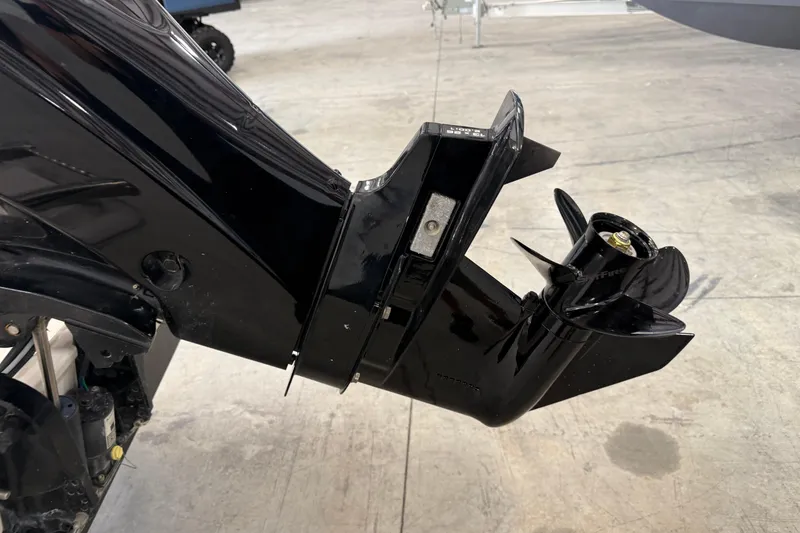 Slide: The Image of Close-up of a 2021 Boston Whaler 130 Super Sport boat motor propeller. - 6