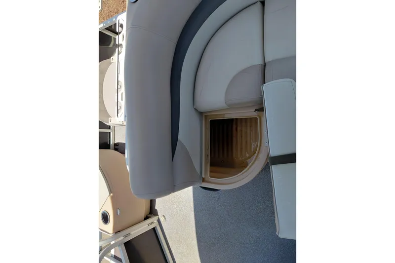 Slide: The Image of 2015 Sun Tracker Bass Buggy 18 DLX pontoon boat interior with storage compartment. - 29