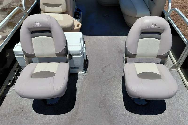 Slide: The Image of 2015 Sun Tracker Bass Buggy 18 DLX boat interior with two cushioned seats. - 12