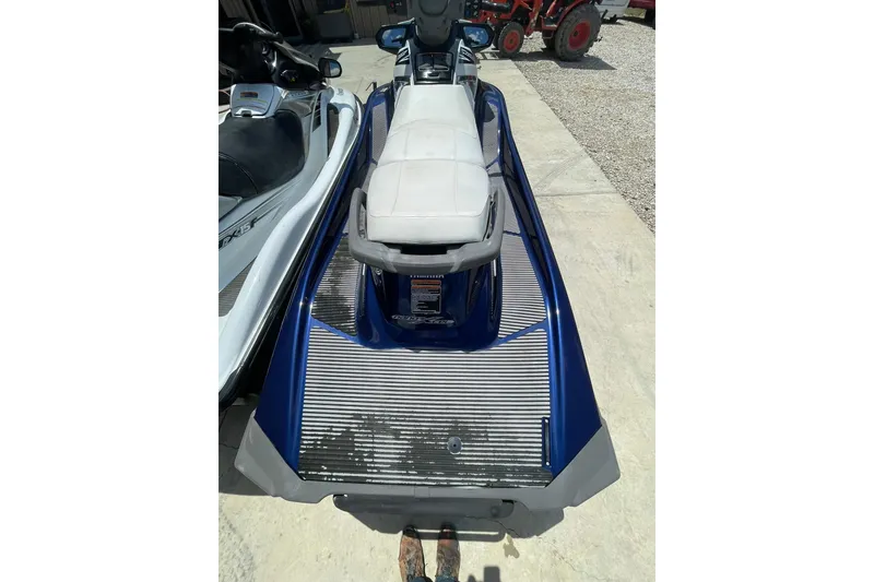 Slide: The Image of 2016 Yamaha VX-Deluxe jet ski in blue, parked on concrete. - 3