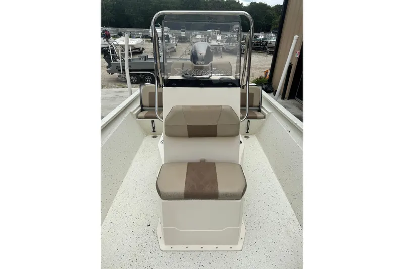 Slide: The Image of 2020 Xpress H22B Bay boat interior with seating and console. - 13