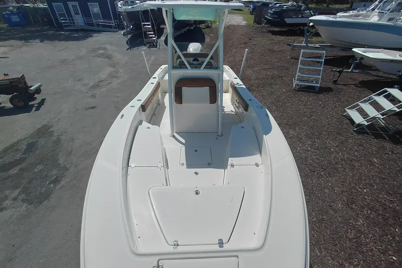 Slide: The Image of 2023 Pioneer 220 Bay Sport boat, top view, showcasing spacious deck and sleek design. - 8