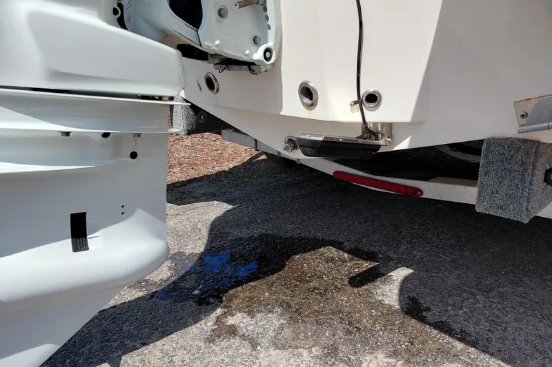 Slide: The Image of Rear view of a 2023 Pioneer 220 Bay Sport boat on a trailer. - 63