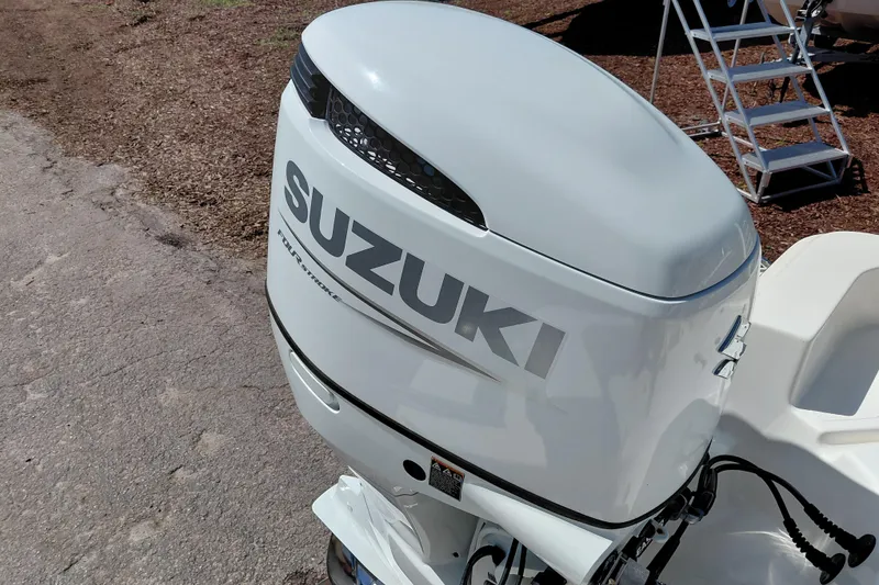 Slide: The Image of Suzuki four-stroke outboard motor on 2023 Pioneer 220 Bay Sport boat. - 51