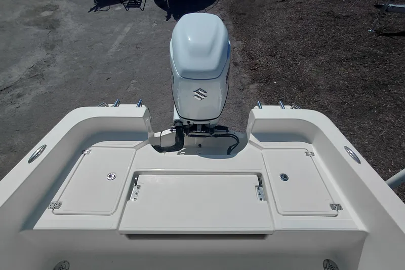 Slide: The Image of 2023 Pioneer 220 Bay Sport boat with Suzuki outboard motor, rear deck view. - 39