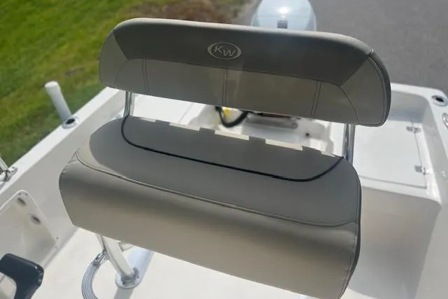 Slide: The Image of 2024 Key West 1720 Center Console boat seat, featuring sleek gray upholstery and sturdy design. - 10
