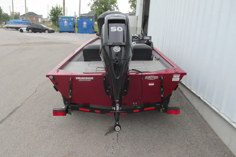 Slide: The Image of 2020 Tracker Pro 170 boat with Mercury engine, parked outdoors. - 3