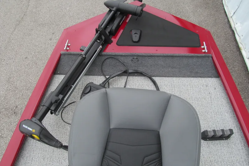 Slide: The Image of 2020 Tracker Pro 170 boat interior with gray seat and trolling motor. - 9
