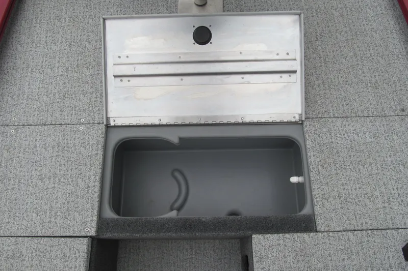 Slide: The Image of 2020 Tracker Pro 170 boat storage compartment with open lid, showcasing interior space. - 8