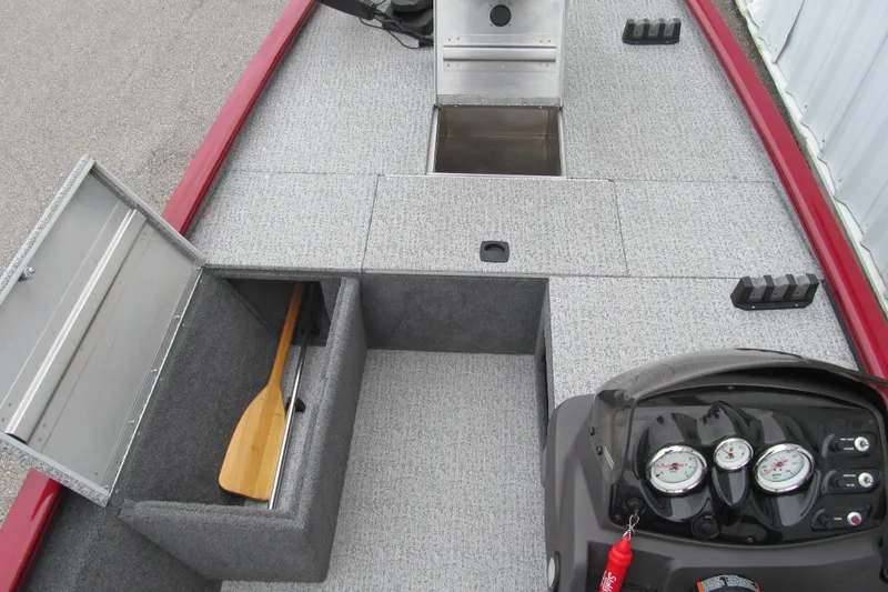 Slide: The Image of 2020 Tracker Pro 170 boat interior with storage compartments and control panel. - 7