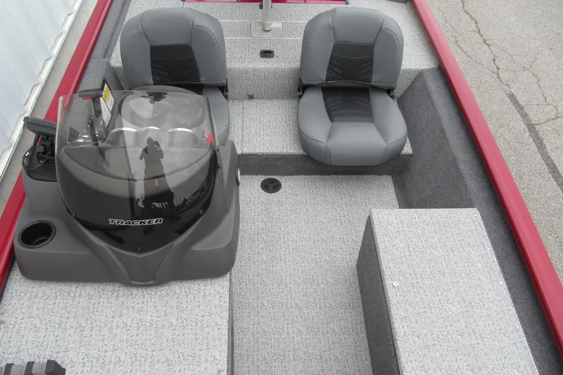 Slide: The Image of 2020 Tracker Pro 170 boat interior with gray seating and console. - 11