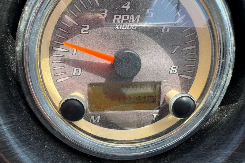 Slide: The Image of Close-up of a 2011 Yamaha Boats 242 Limited RPM gauge displaying engine speed. - 18