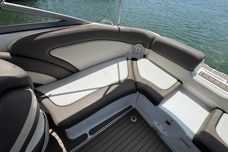 Slide: The Image of Interior seating of a 2011 Yamaha Boats 242 Limited, featuring sleek design and comfortable upholstery. - 21