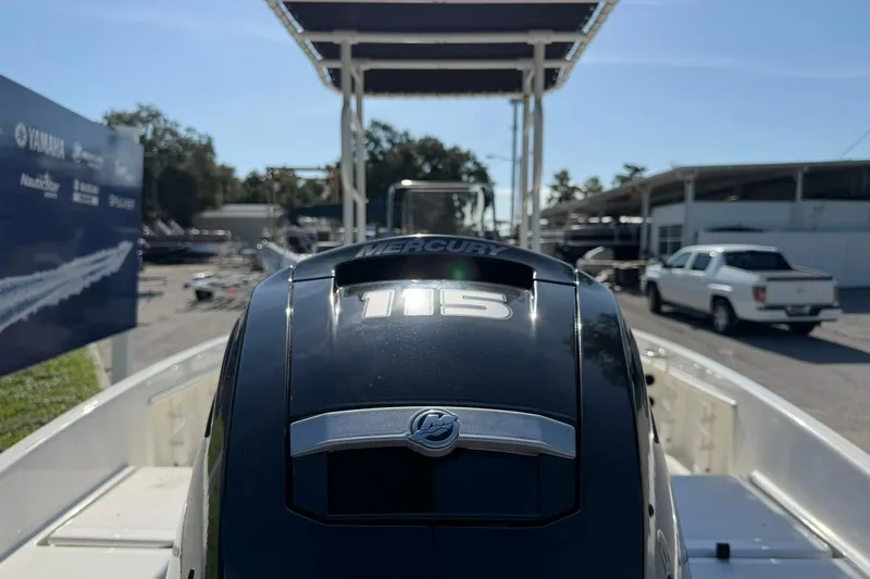 Slide: The Image of 2025 Bayliner Trophy T18 with Mercury 115 engine at a marina. - 34