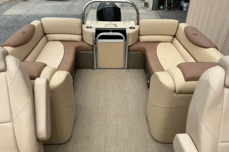 Slide: The Image of 2019 Avalon Catalina Quad Lounge interior with beige and brown seating, spacious layout. - 5
