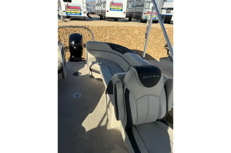 Slide: The Image of 2023 South Bay 224RS LE boat interior with plush seating and modern design. - 14