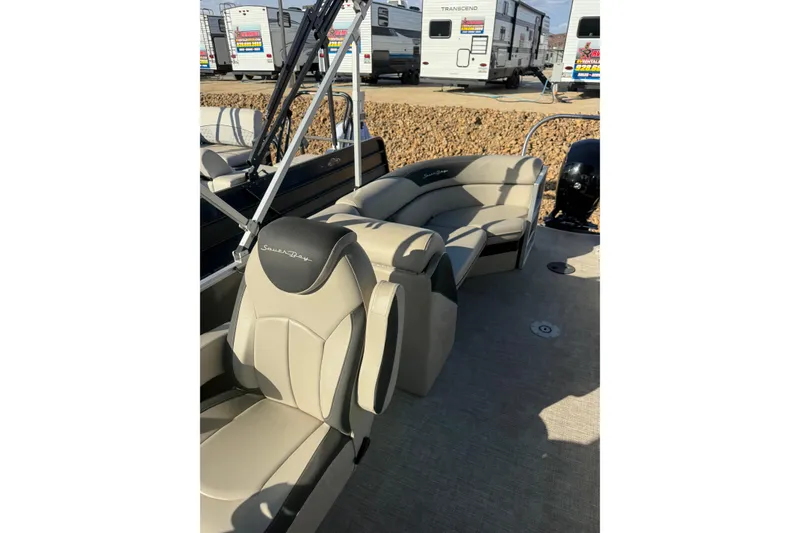 Slide: The Image of 2023 South Bay 224RS LE boat interior with plush seating and modern design. - 10