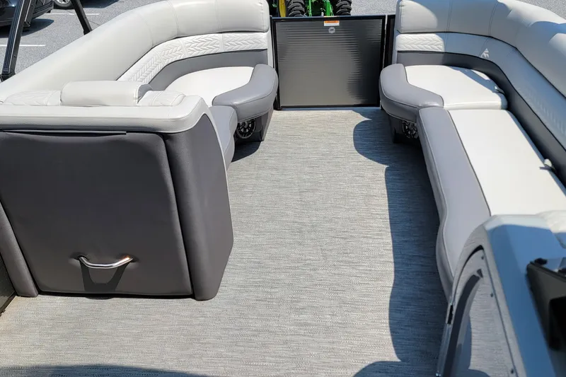 Slide: The Image of Interior of a 2021 Godfrey Monaco 235 C pontoon boat with plush seating. - 14