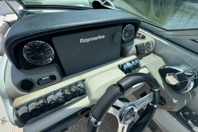 Slide: The Image of Dashboard of 2018 Crownline Eclipse E30 boat with Raymarine navigation system. - 12