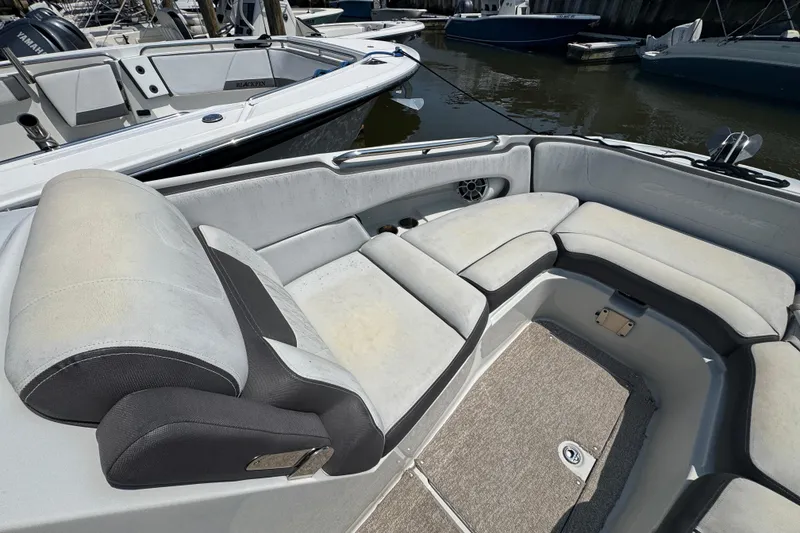 Slide: The Image of 2018 Crownline Eclipse E30 boat interior with plush seating and modern design. - 18