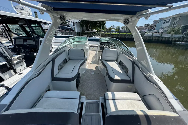Slide: The Image of 2018 Crownline Eclipse E30 boat interior with spacious seating and modern design. - 4