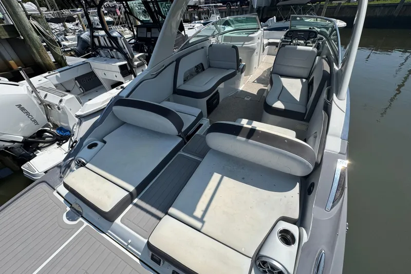 Slide: The Image of 2018 Crownline Eclipse E30 boat interior with spacious seating and modern design. - 3
