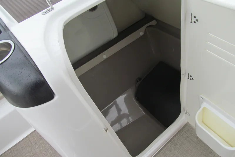 Slide: The Image of Interior storage compartment of 2013 Yamaha Boats 242 Limited S. - 9