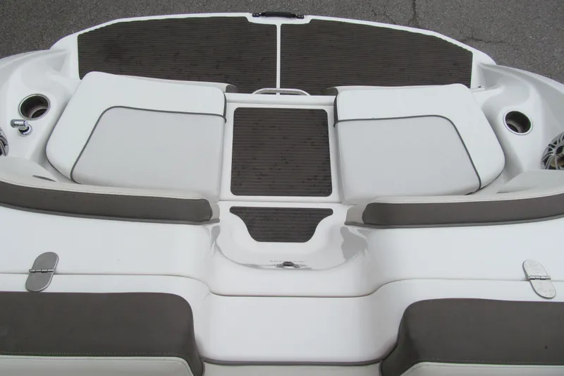 Slide: The Image of 2013 Yamaha Boats 242 Limited S swim platform with cushioned seating and cup holders. - 14