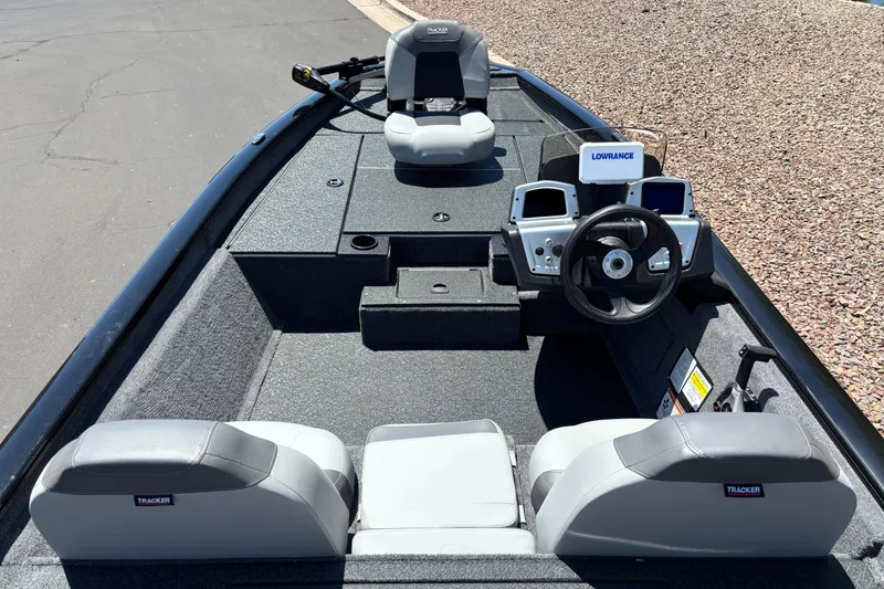 Slide: The Image of 2027 Tracker Pro Team 175 boat interior with steering wheel and seating. - 3
