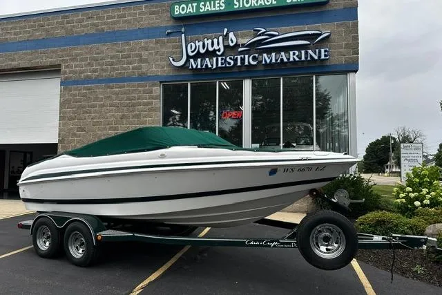 Slide: The Image of 1999 Chris-Craft 200 Bowrider SS on trailer at Jerry's Majestic Marine dealership. - 29