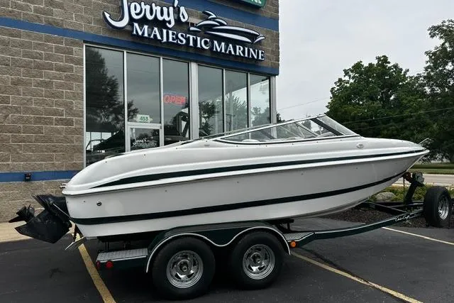Slide: The Image of 1999 Chris-Craft 200 Bowrider SS boat on trailer at Jerry's Majestic Marine. - 2