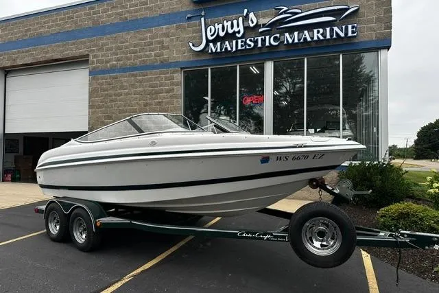 Slide: The Image of 1999 Chris-Craft 200 Bowrider SS on trailer at Jerry's Majestic Marine dealership. - 1