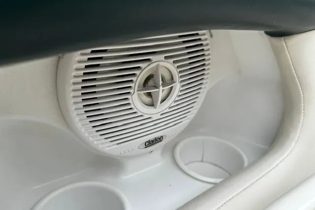Slide: The Image of Speaker and cup holders in 1999 Chris-Craft 200 Bowrider SS boat interior. - 22