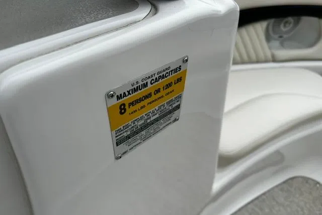 Slide: The Image of 1999 Chris-Craft 200 Bowrider SS capacity label, seating for 8 or 1200 lbs. - 14